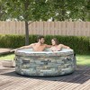 Outsunny 4 Person Inflatable Portable Hot Tub Outdoor Round Heated Spa with  108 Jets, Pump, Cover, Filter Cartridges, Brown for w/ External