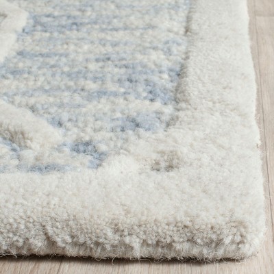 Handmade Light Blue/Ivory Tufted Wool Round Rug, 3' x 5'