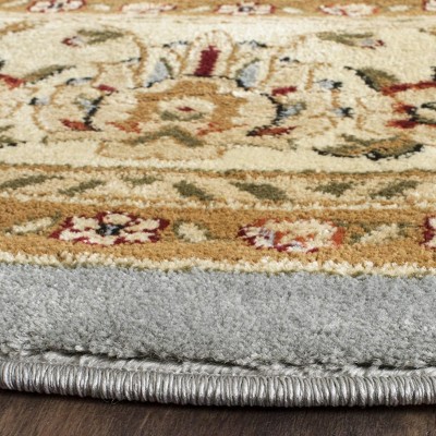 Lyndhurst Light Blue and Ivory Round Synthetic Area Rug