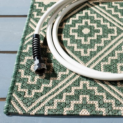 Dark Green and Beige Geometric Indoor/Outdoor Area Rug 4' x 5'7"