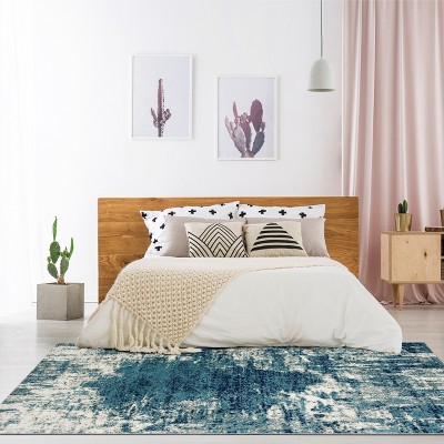 Light Blue Abstract 8' x 10' Stain-Resistant Synthetic Rug
