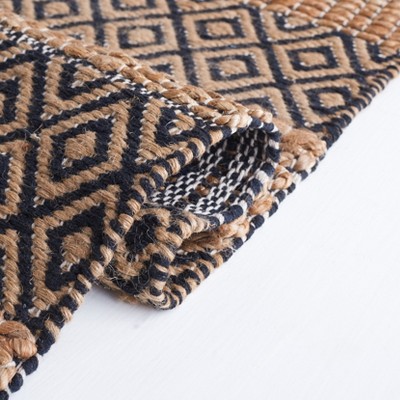 Handmade Black and Natural Cotton Flat Woven Rug