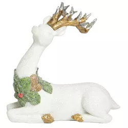 Transpac Resin 8 in. White Christmas Elegantly Carved Sitting Reindeer Decor