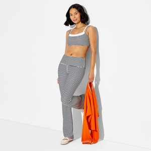 Leggings acampanados mini con dobladillo reversible para mujer - JoyLab™