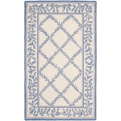 Ivory and Blue Hand-Hooked Wool Floral Area Rug 10' x 14'