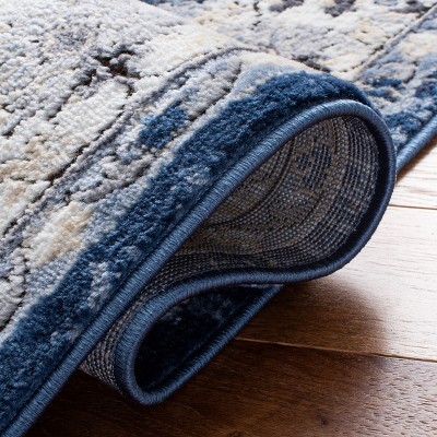 Ivory Geometric 4' x 6' Hand-Knotted Synthetic Area Rug