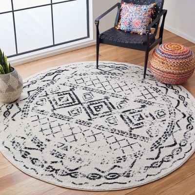 Ivory and Black Boho-Chic Synthetic 3' Round Area Rug