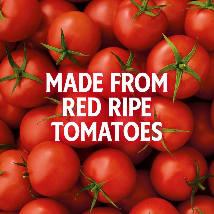 Ketchup packaging panel showing red colored tomatoes with green stems and large white text reading 'MADE FROM RED RIPE TOMATOES'.