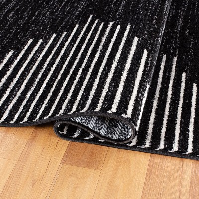 Bohemian Black and White Stripe Synthetic Runner Rug 2' x 7'