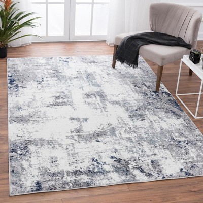 Ivory and Gray Abstract Synthetic Area Rug 4' x 5'