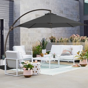 HYLEORY Outdoor Curvy Cantilever Umbrella with Sand Bag Base, Size: 132"/144" - 1 of 4
