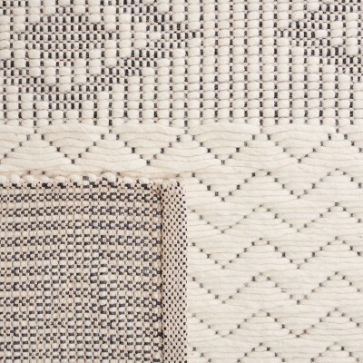 Ivory and Black Flat Woven Wool Area Rug 4' x 6'