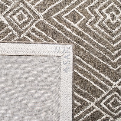 Handmade Dark Grey and Ivory Wool Tufted Round Area Rug