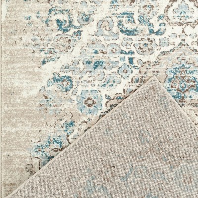 Cream and Blue 9' x 12' Synthetic Oriental Area Rug