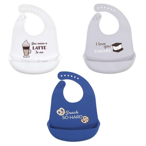 White plastic baby store bibs