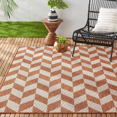 Orange and Ivory Geometric 8' x 10' Synthetic Area Rug