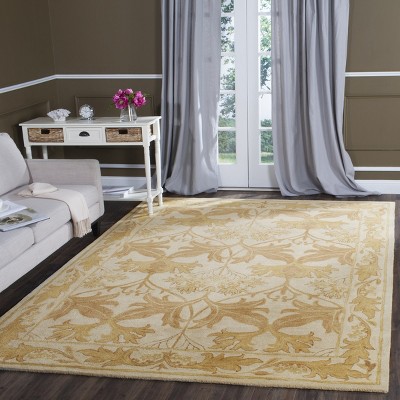 Antiquity Beige and Gold 6' x 9' Wool Area Rug