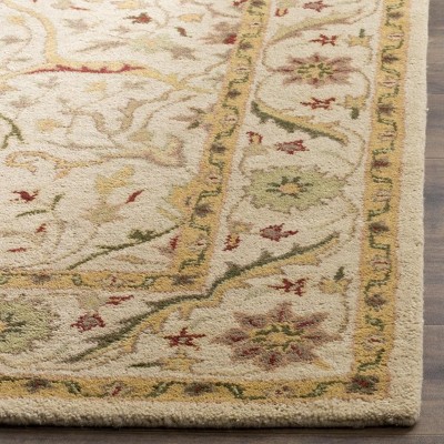 Elegant Ivory Wool 3' x 5' Hand-Tufted Rectangular Area Rug