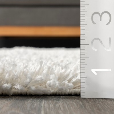 Ivory Rectangular Braided Shag Area Rug with Tassels