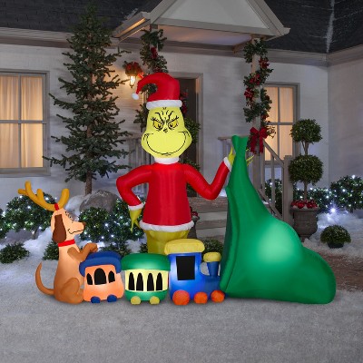 Grinch and Max Christmas Inflatable with Train and Santa Sack