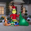 Grinch Christmas Airblown Inflatable Putting Train In Santa Sack Scene ...