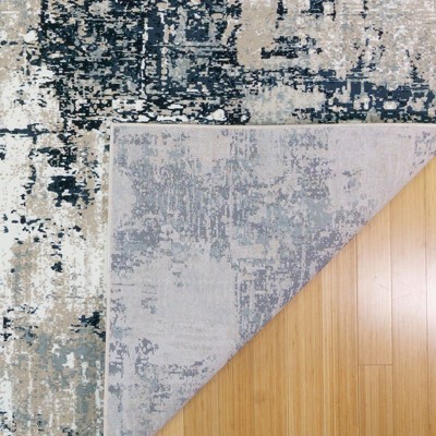 Ivory and Navy Abstract 5' x 7' Synthetic Area Rug