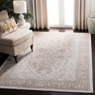 Isabella Cream and Beige Synthetic Rectangular Area Rug 6'7" x 9'