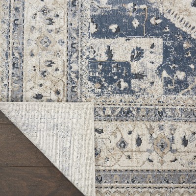 Ivory and Blue Geometric Floral Synthetic Area Rug