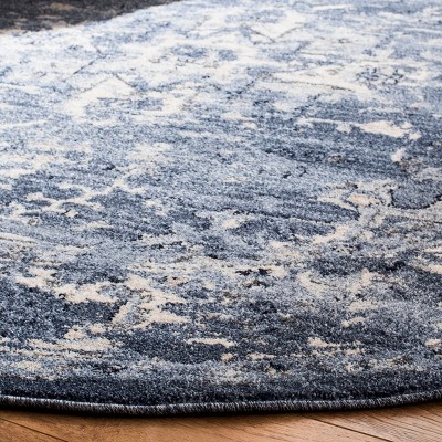 Navy and Creme 9' x 12' Synthetic Reversible Area Rug