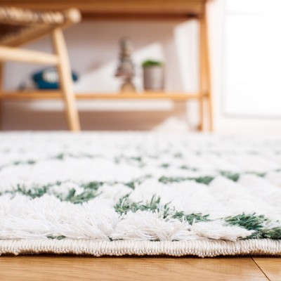 Ivory and Green Synthetic Flat Woven 5' x 7' Rug