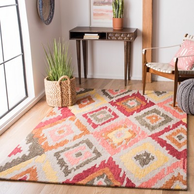Handmade Red Ikat Wool Tufted Area Rug