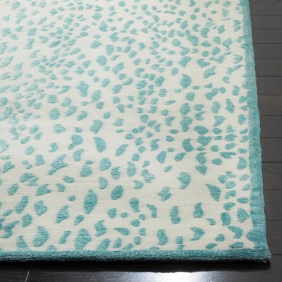 Ivory and Turquoise Flat Woven Rectangular Wool Area Rug