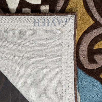 Wyndham Blue and Multi Wool 4' x 6' Hand-Tufted Area Rug