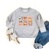 The Juniper Shop Coquette Girl Halloween Bow Chart Toddler Graphic Sweatshirt - 2 of 3
