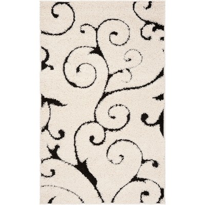 5'3"x7'6" Swirl Loomed Area Rug Ivory/Black - Safavieh