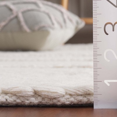 Ivory Elegance 4' x 6' Hand-Tufted Wool Rectangular Rug
