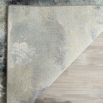 Glacier Blue and Multi Abstract 4' x 6' Synthetic Area Rug