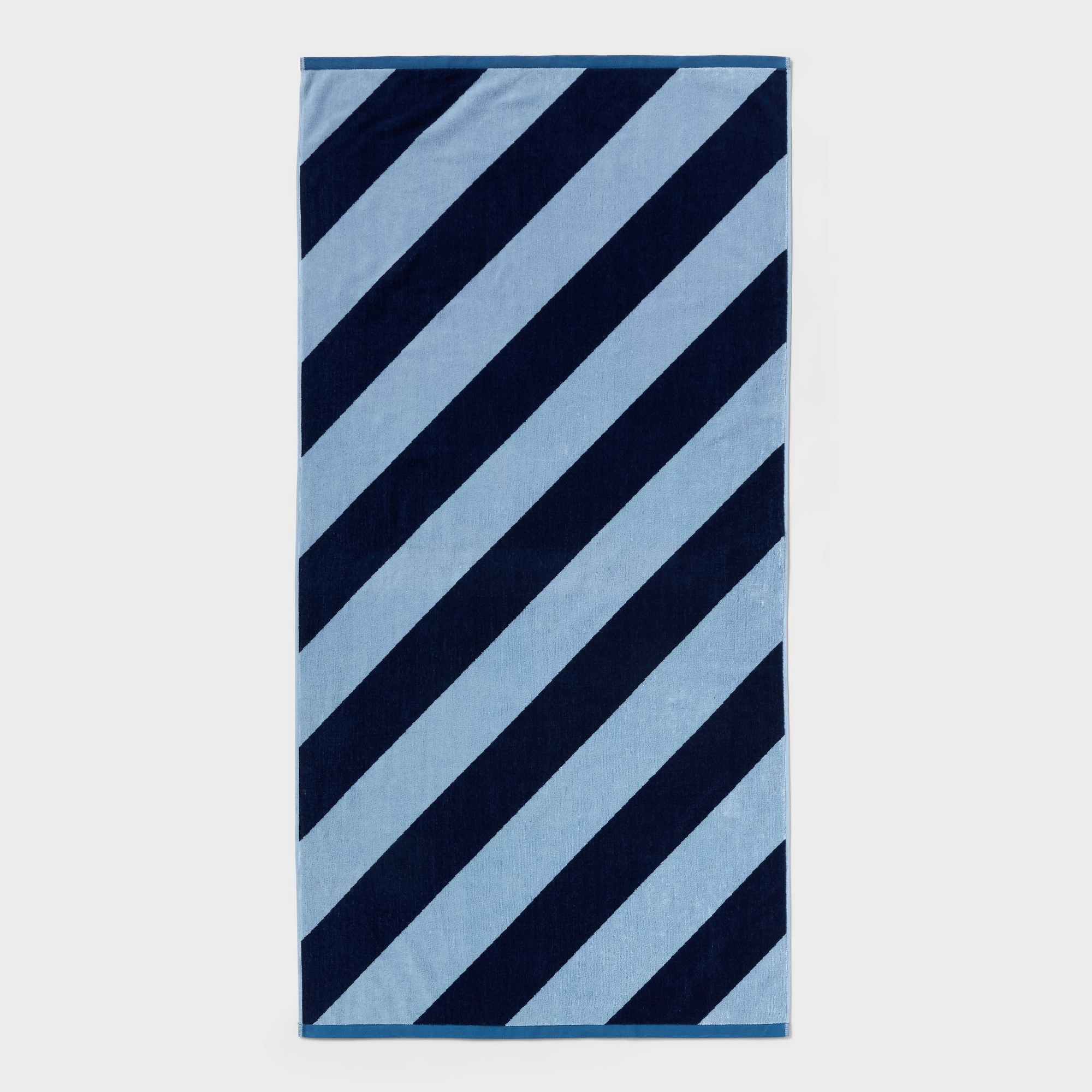 36"x72" Reversible Diagonal Striped Oversized Beach Towel Blue/Navy Blue - Room Essentials™