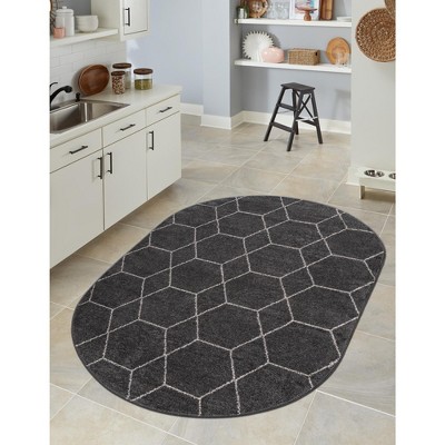 Trellis Frieze Dark Gray and Ivory Oval Synthetic Area Rug