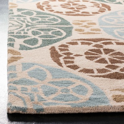 Beige and Blue 6' x 9' Hand-Tufted Wool Area Rug