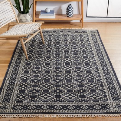 Handmade Black and Ivory Wool Flat Weave Area Rug, 4' x 6'