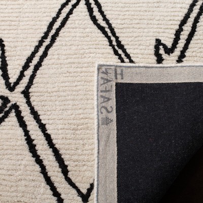 Ivory and Black Hand-Tufted Wool Shag Area Rug 4' x 6'