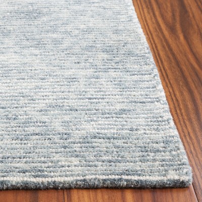 Ebony EBN950 Handmade Tufted Rug - Safavieh