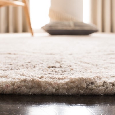 Ivory Rectangular Hand-Tufted Wool Area Rug