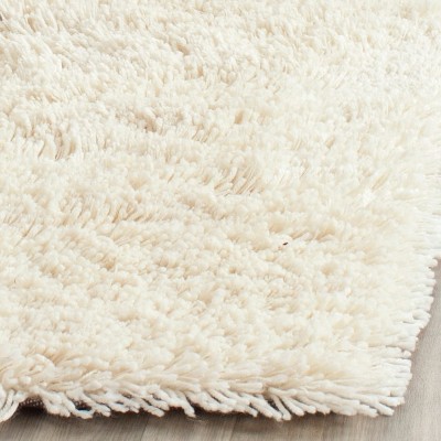Ivory Tufted Shag 7'6" x 9'6" Wool Area Rug