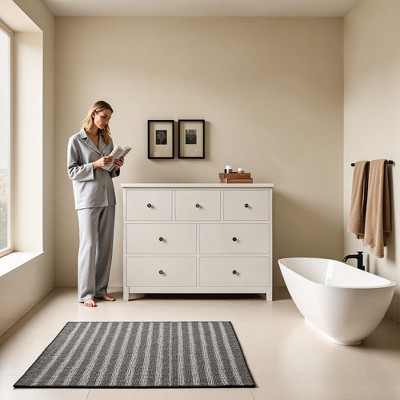 Luck Live The bathroom storage cabinet is 44.88 in ches in size, has seven drawers, and is in an off-white color.