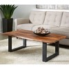 Coast to Coast Brownstone II 54" Natural Wood and Black Cocktail Table - 2 of 4