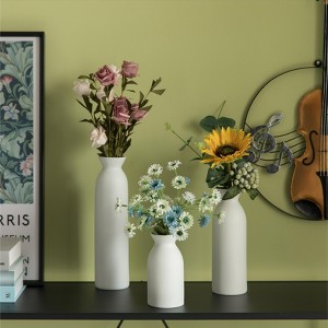 Uniquewise Modern White Cylinder Shaped Ceramic Table Flower Vase Holder - Elegant Home Decor Accent, Ideal for Fresh and Artificial Flowers - 1 of 4