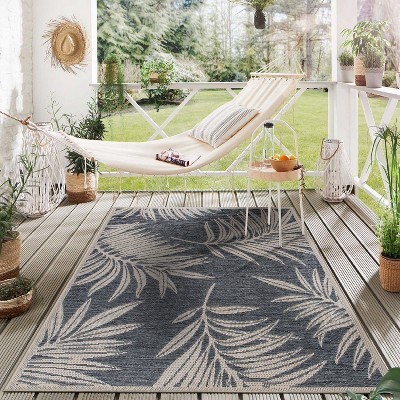 Blue and Beige Floral Synthetic 5' x 7' Area Rug