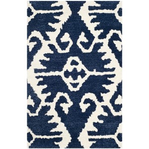 Wyndham WYD323 Hand Tufted Indoor Rugs - Safavieh - 1 of 3